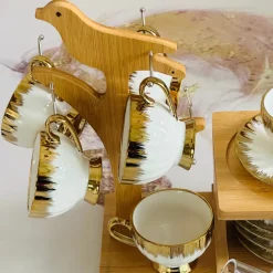 Golden Winged Haven (set of six cups and saucers, teapot, wooden stand)