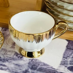 Golden Winged Haven (set of six cups and saucers, teapot, wooden stand)
