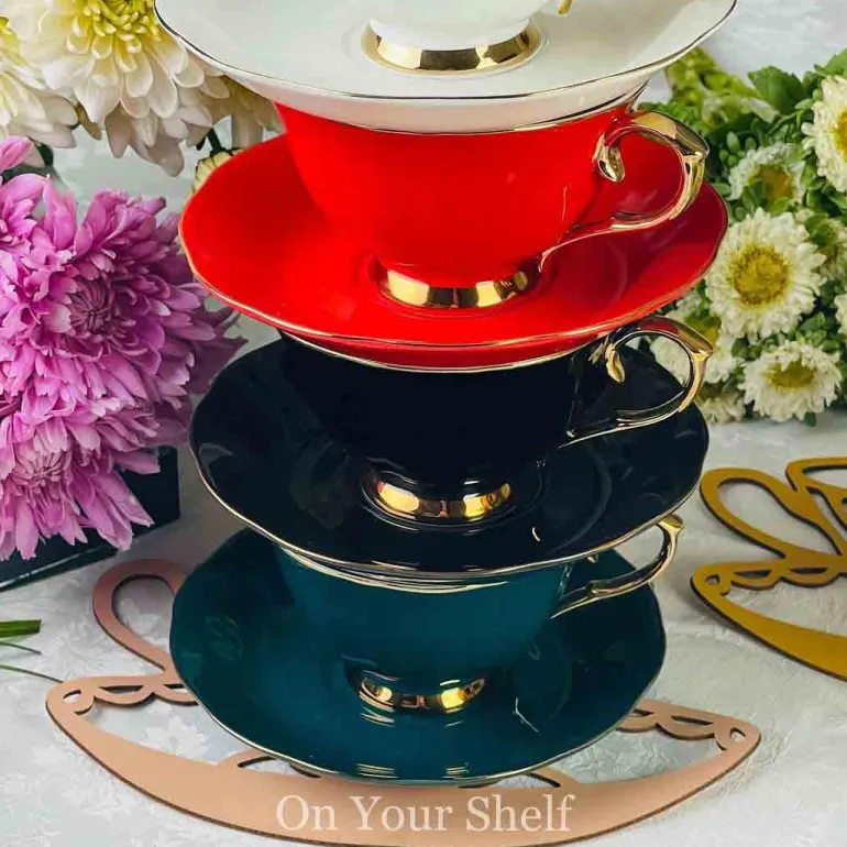 The Plain Black Teacups and Saucers