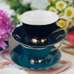 The Plain Black Teacups and Saucers